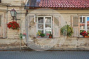 Wooden House Facade with flowers - Cesis, Latvia
