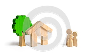 Wooden house and family. Buying a new home. State program of assistance to young families. Subsidy. Rental housing, Mortgage