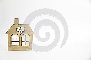Wooden house icon isolated on white background with copy space, real estate, new home and mortgage concept