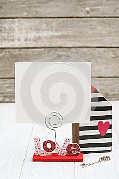 Wooden house, key, empty card in cardholder