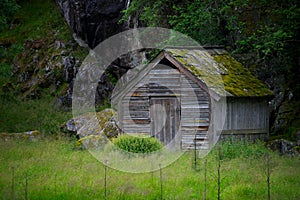 Wooden house in scandinavian landscape