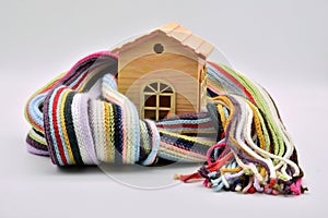 Wooden house sheltered with a scarf photo