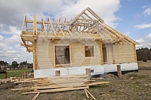 Wooden house under construction.