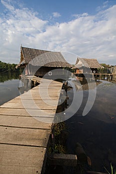 Wooden houses along the river, Kanchanaburi, Thailand