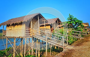 Wooden houses built on high stilts called in Chitwan