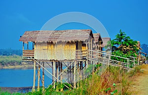 Wooden houses built on high stilts called in Chitwan