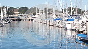 Wooden houses on piles, ocean bay harbor. Old Fisherman's Wharf. Monterey Marina