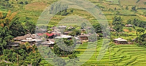 Wooden houses with terraced rice field in Dien Bien, northern Vietnam