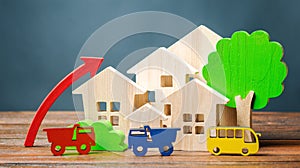 Wooden houses, vehicles, trees and up arrow. The concept of increasing air pollution. The growth of traffic in the city. Favorable