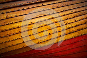 The wooden hull of a small boat for use as a background or texture