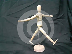 A wooden human toy