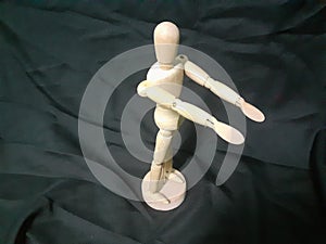 A wooden human toy