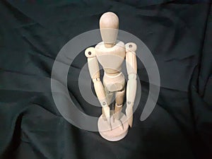 A wooden human toy