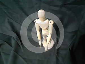 A wooden human toy