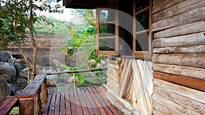 Wooden hut opened window in the valley