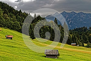 Farm sheds in mountains fall season landscape photo