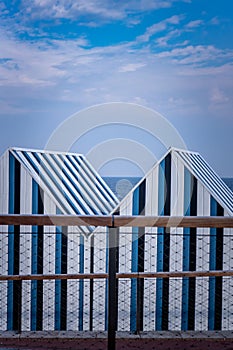 Wooden huts on Yport beach in Normandy, France