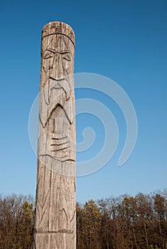 Wooden idol Slavic god Svarog
