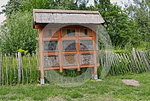 Wooden insect hotel in a park in Germany