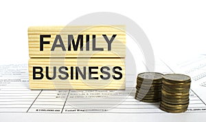 Wooden jenga with text Family Business. Finance conzept photo