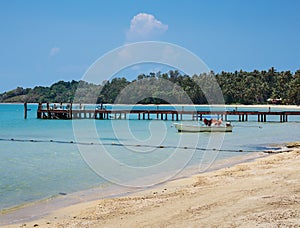 Wooden jetty on exotic beach Koh Chang island, Thailand