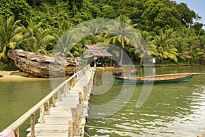 Wooden jetty at local village, Ream National Park, Cambodia photo