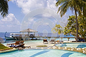 Wooden jetty over the beautiful Maldivian ocean