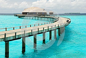 Wooden jetty over blue sea