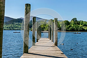 A wooden jetty or pier on a river or lake.