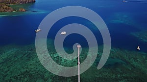 Wooden jetty on turquoise water in Labuan Bajo