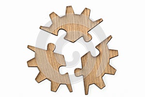 Wooden jigsaw puzzle, pieces of a puzzle, gear, Isolated on White Background