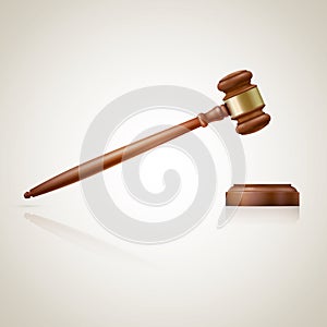 A wooden judge gavel and soundboard