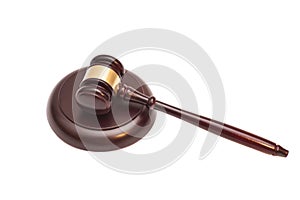 Wooden judge gavel and soundboard isolated