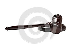 Wooden judge gavel and soundboard isolated on a white background