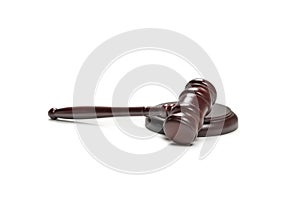 Wooden judge gavel and soundboard isolated on a white background