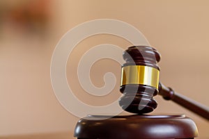 wooden judge gavel on table as symbol of justice for use in legal cases judicial system and civil rights and social justice
