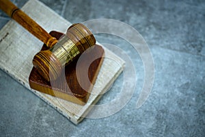 Wooden judge`s gavel. The criminal law.