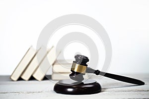 Wooden judge`s gavel. The criminal law.