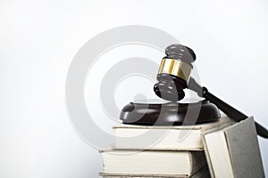 Wooden judge`s gavel. The criminal law.