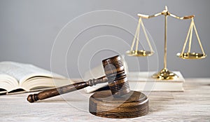 Wooden judge`s gavel. The criminal law.