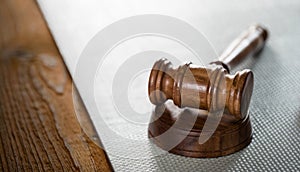 Wooden judge`s gavel. The criminal law.