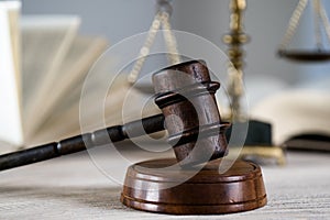 Wooden judge`s gavel. The criminal law.