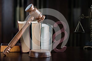 Wooden judge`s gavel. The criminal law.