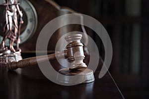 Wooden judge`s gavel. The criminal law.