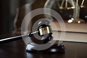 Wooden judge`s gavel. The criminal law.