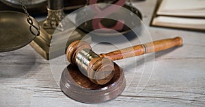 Wooden judge`s gavel. The criminal law.