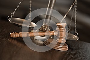 Wooden judge`s gavel. The criminal law.