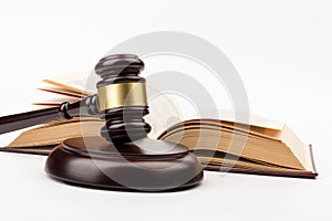 Wooden judges gavel on gray background in close up. Space for text