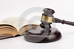 Wooden judges gavel on gray background in close up. Space for text