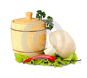 Wooden keg with peper and mushroom isolated on wh